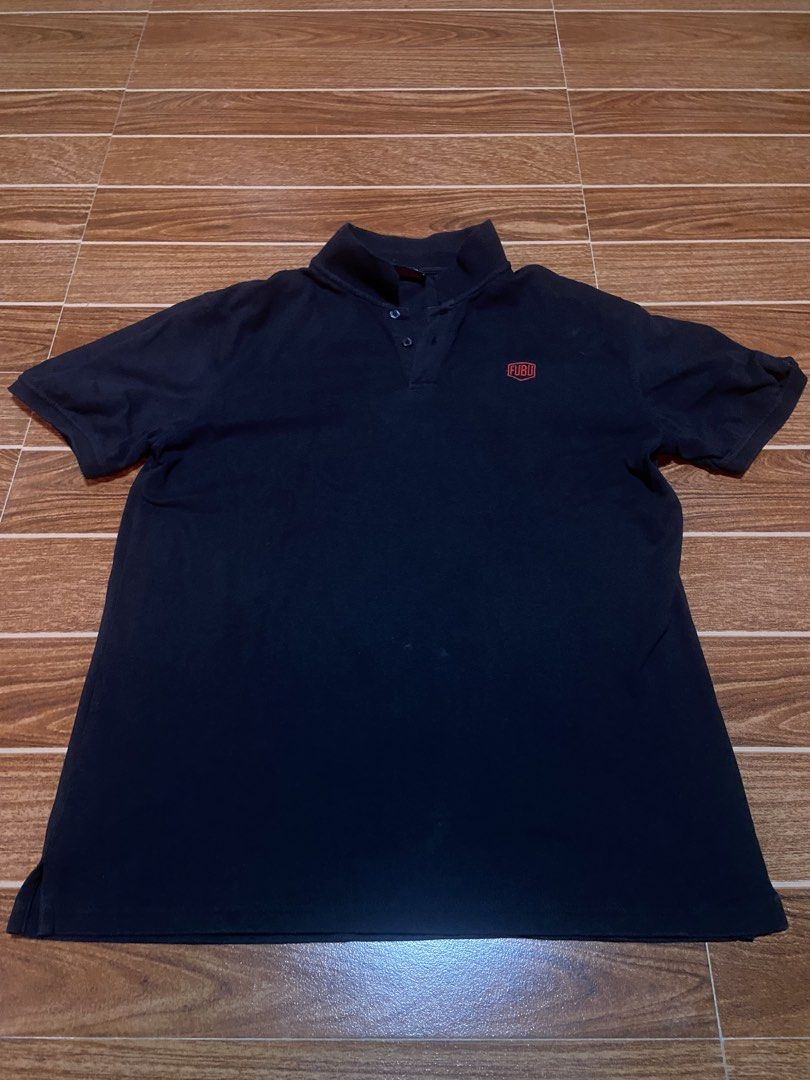 FUBU Polo Shirt 2XL (Category: Tshirts & Polo Shirts ) located in Taguig. Submitted by cool.hellraiser (Listing ID 1432643316, Image 1). Description: - FUBU polo shirt - Black with red logo - Size: 2XL - Collared neckline with buttons - Comfortable material - Classic and versatile design.