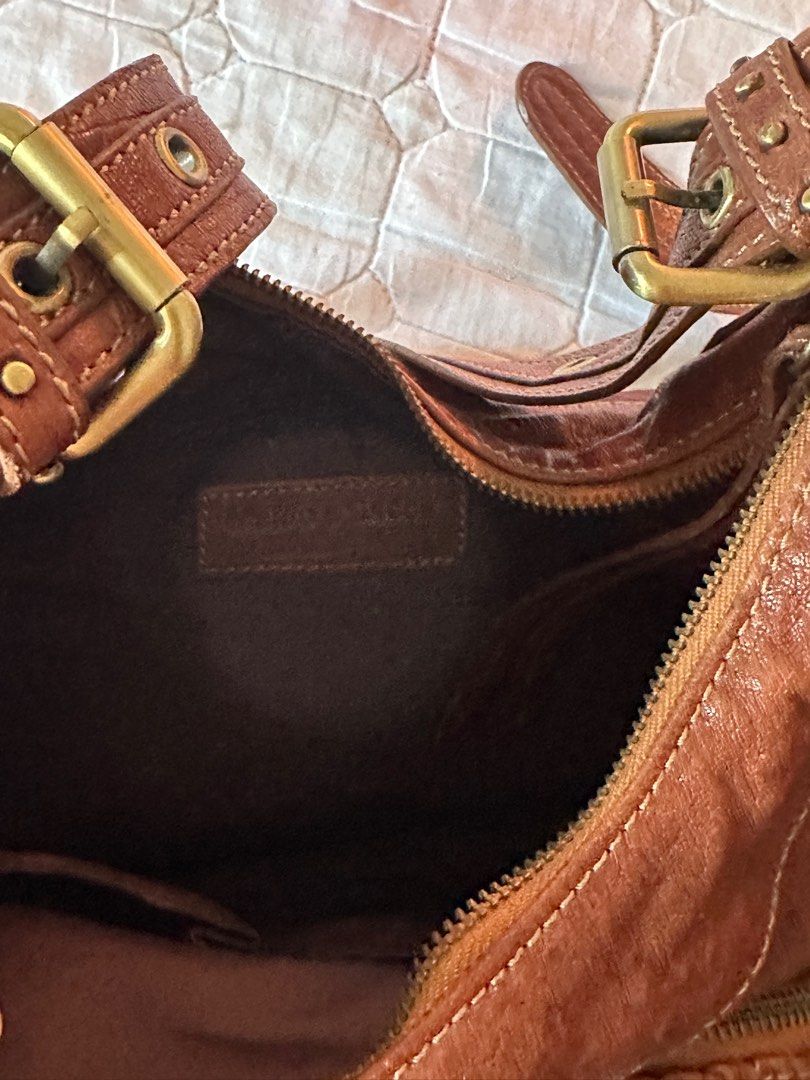 Full leather Vintage bag 2 way (Category: Shoulder Bags) located in Manila. Submitted by macsony (Listing ID 1432685433, Image 3). Description: Like new. 2 way cross body bag and shoulder bag adjustable handle.