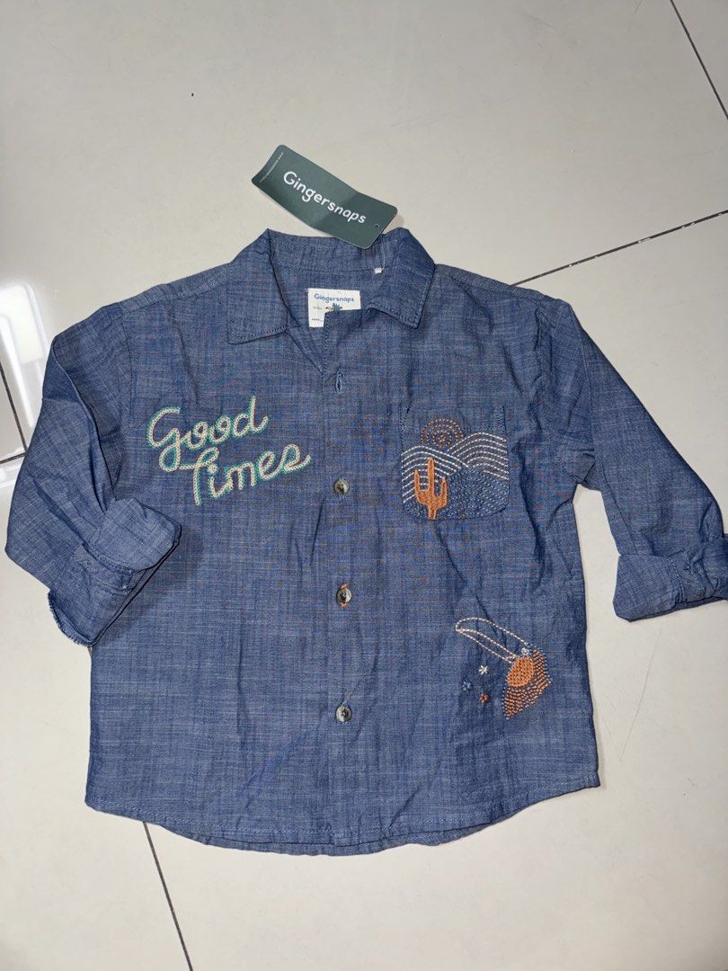Gingersnaps Boys' Shirt - 4Y (Category: Babies & Kids Fashion) located in Manila. Submitted by declutter_with_mrs (Listing ID 1432749519, Image 1). Description: - Gingersnaps Boys' Shirt - Size: 4Y - Features embroidered "Good Times" and desert scene - Denim-like material RFS: decluttering MOP: gcash MOD: grab/lalamove PICKUP LOC: BGC, Taguig SF shoulder by buyer STRICTLY PAYMENT FIRST BEFORE PICKUP.