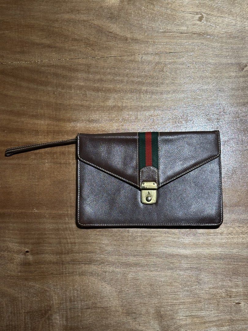 Gucci Sherry Line Clutch Bag (Category: Luxury Bags & Wallets) located in Bacolod City. Submitted by dannnsoy (Listing ID 1432607050, Image 1). Description: Gucci Sherry Line Clutch Bag •In very good condition •Dimension: 10” x 6.5” •Issue: See photos for reference •Price: 3699 only.
