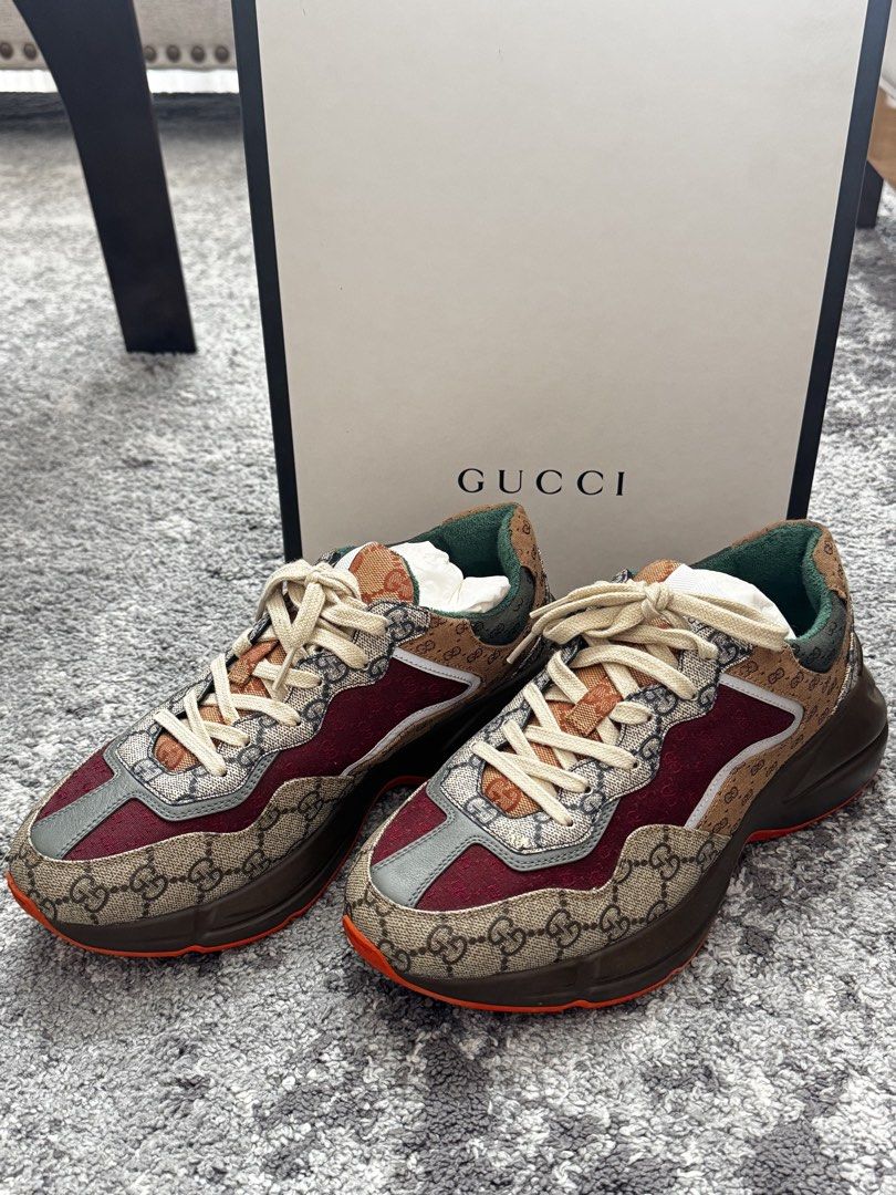 Gucci Ultrapace Sneakers (Category: Sneakers & Footwear) located in Hermosa. Submitted by sabzai (Listing ID 1432611839, Image 2). Description: - Authentic Gucci Ultrapace sneakers - Features the iconic Gucci monogram pattern - Color combination: Brown, burgundy, and green - Sole color: Brown with orange accent - Condition: Worn once - Includes: Original box, dust bag, extra laces, and receipt It’s my husband’s shoes, apparently he really preferr