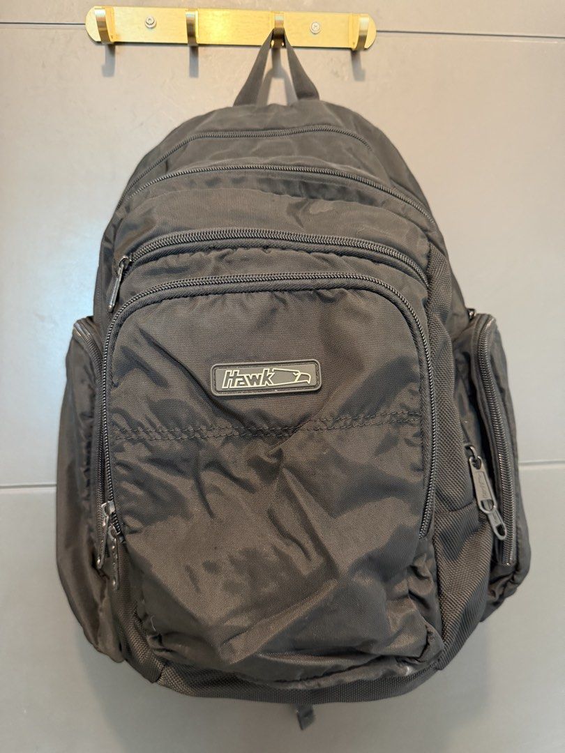 Hawk Backpack (Category: Backpacks) located in Mandaluyong City. Submitted by unomarcelo001 (Listing ID 1432608693, Image 2). Description: - Durable Hawk backpack - Multiple compartments for organized storage - Front pocket with Hawk logo - Side pockets - Zippered compartments - Top handle for easy carrying - Adjustable shoulder straps - Practical for everyday use.
