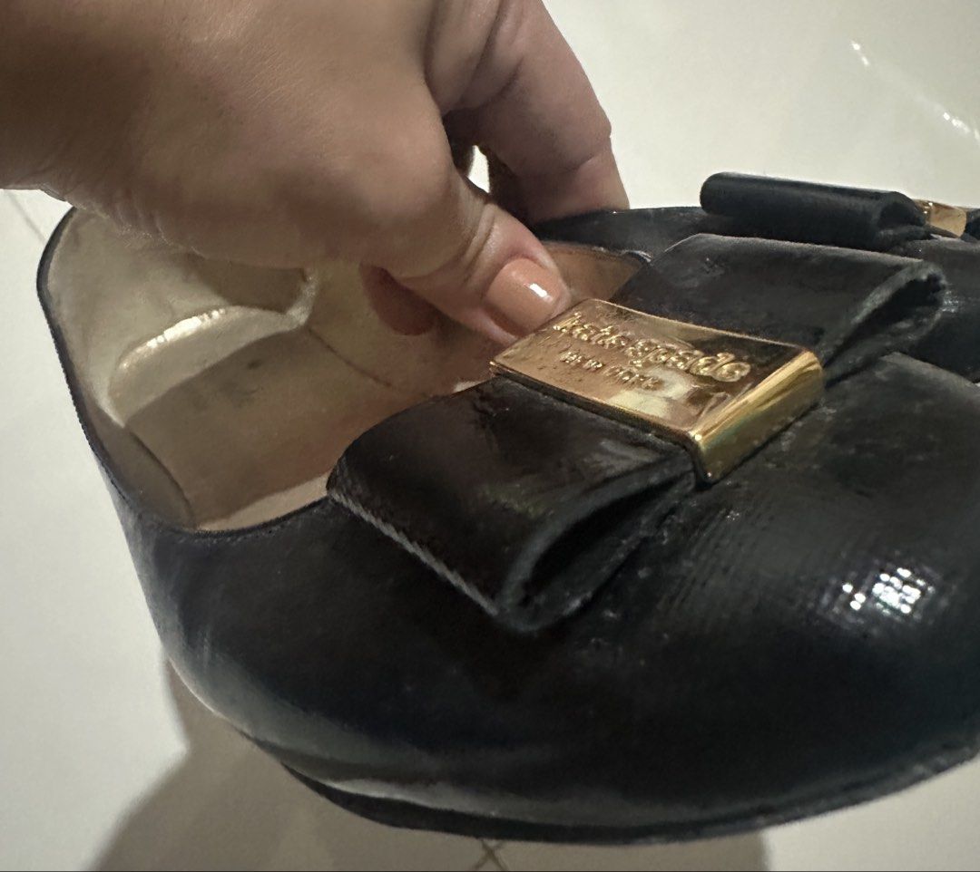 Kate Spade Black Flats (Category: Flats & Sandals) located in Cabadbaran. Submitted by KsGoodFind (Listing ID 1432655849, Image 3). Description: ✔️ukay source ✔️pls refer photos posted for reference, as is ✔️stitched all around the shoes - Bow detail with gold-tone accent - Size 6W - 23.5 - Gold-toned insole with Kate Spade New York logo - Signs of wear on sole .