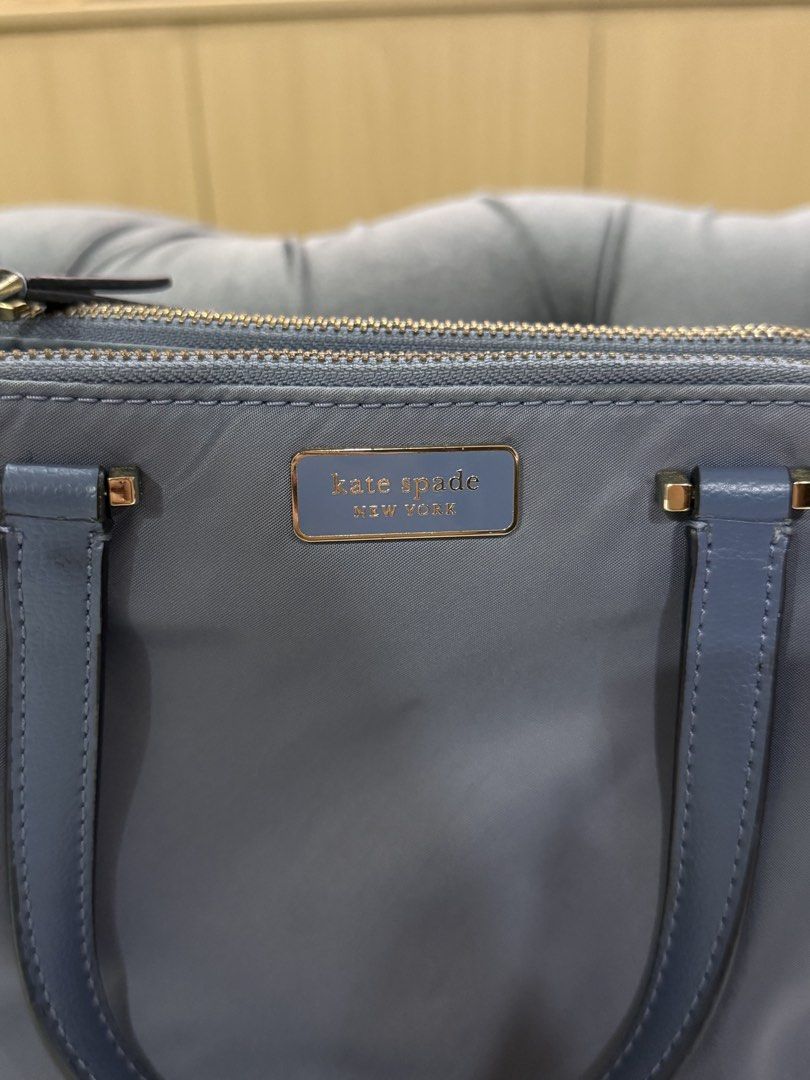Kate Spade New York Handbag (Category: Luxury Bags & Wallets) located in Quezon City. Submitted by prelovedbyvielle (Listing ID 1432756061, Image 2). Description: - 💯 AUTHENTIC KATE SPADE BOUGHT DIRECTLY FROM USA - Blue Crossbody Bag - Nylon Texture - Has Flaws; Please See Images Posted - No Box, No Receipts, No Dust Bag.