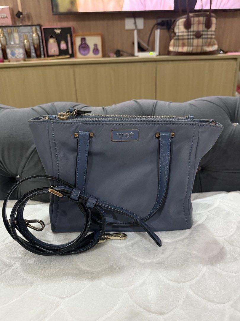 Kate Spade New York Handbag (Category: Luxury Bags & Wallets) located in Quezon City. Submitted by prelovedbyvielle (Listing ID 1432756061, Image 1). Description: - 💯 AUTHENTIC KATE SPADE BOUGHT DIRECTLY FROM USA - Blue Crossbody Bag - Nylon Texture - Has Flaws; Please See Images Posted - No Box, No Receipts, No Dust Bag.
