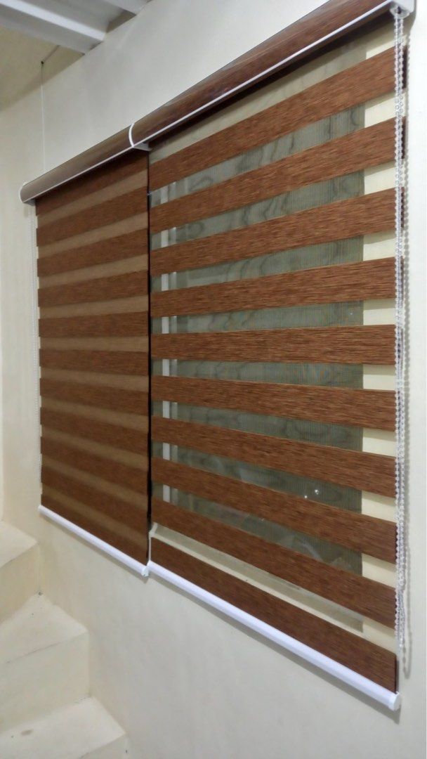 Korean Duo Semi Blackout Aesthetic Blinds (Category: Curtains & Blinds) located in Quezon City. Submitted by livingminimal8 (Listing ID 1432682949, Image 1). Description: - Wood Teak W516 aesthetic blinds - Color: Brown - Size: 120 width x 150cm height - Design: Dual-layer with alternating opaque and translucent stripes - Operation: Beaded chain - rfs: decluttering (i have 2 pieces).