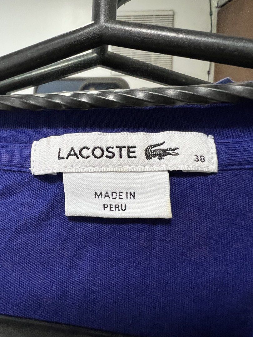 Lacoste V-Neck T-Shirt - Size 38 (Category: Shirts) located in Meycauayan. Submitted by 3fold (Listing ID 1432696095, Image 2). Description: - Authentic Lacoste V-neck T-shirt - Violet in actual - Features the iconic Lacoste crocodile logo - Made in Peru - Size 38 - From Lacoste Operations, Paris (France) - 24x18 dimes.