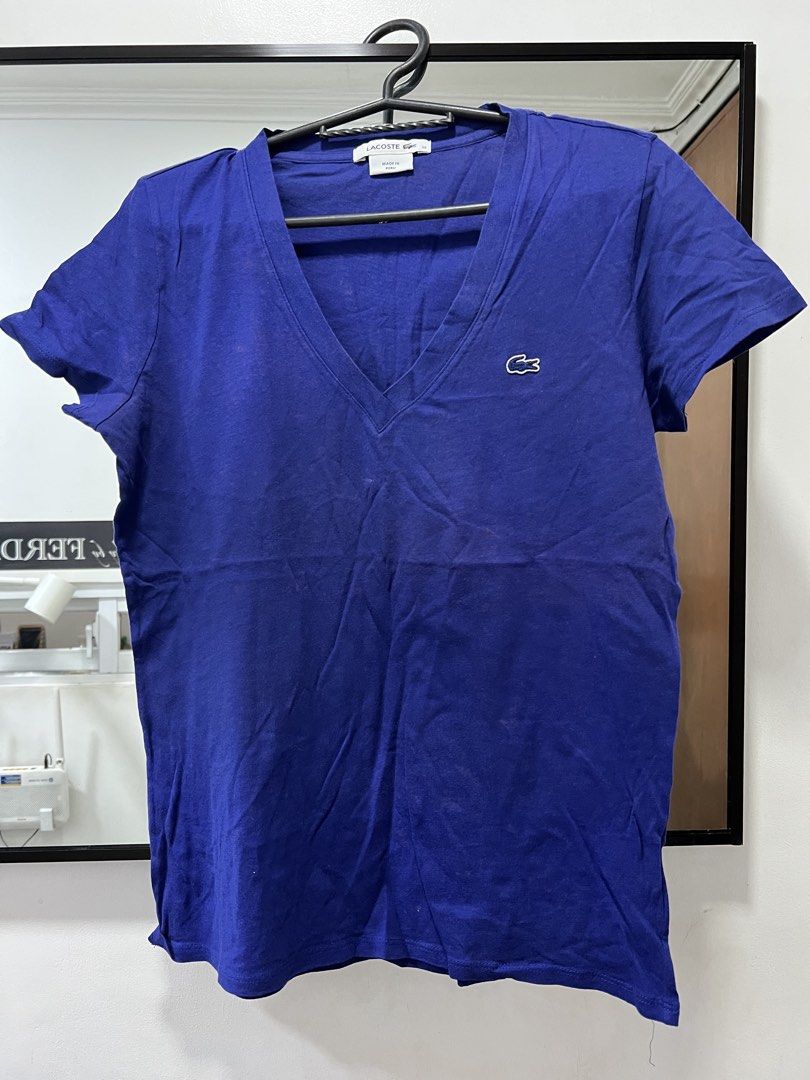 Lacoste V-Neck T-Shirt - Size 38 (Category: Shirts) located in Meycauayan. Submitted by 3fold (Listing ID 1432696095, Image 3). Description: - Authentic Lacoste V-neck T-shirt - Violet in actual - Features the iconic Lacoste crocodile logo - Made in Peru - Size 38 - From Lacoste Operations, Paris (France) - 24x18 dimes.