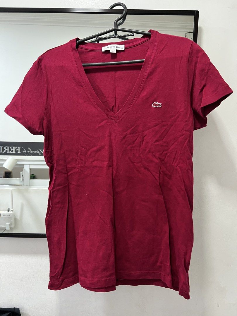 Lacoste V-Neck T-Shirt - Size 40 (Category: Shirts) located in Meycauayan. Submitted by 3fold (Listing ID 1432696412, Image 3). Description: - Authentic Lacoste V-neck T-shirt - maroon color in actual - Iconic Lacoste crocodile logo on the chest - Made in Peru - Size 40 - Style code: TF7880 - From Lacoste Operations, Paris (France).
