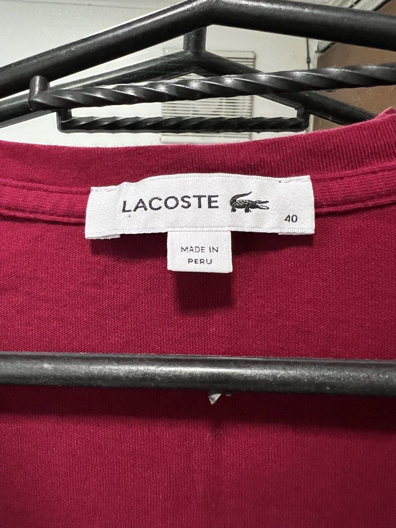 Lacoste V-Neck T-Shirt - Size 40 (Category: Shirts) located in Meycauayan. Submitted by 3fold (Listing ID 1432696412, Image 2). Description: - Authentic Lacoste V-neck T-shirt - maroon color in actual - Iconic Lacoste crocodile logo on the chest - Made in Peru - Size 40 - Style code: TF7880 - From Lacoste Operations, Paris (France).