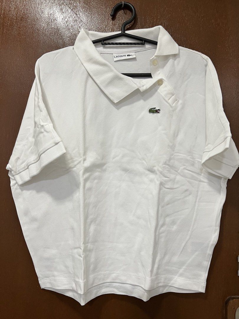 Lacoste White Polo Shirt (Category: Others Tops) located in Meycauayan. Submitted by 3fold (Listing ID 1432698598, Image 1). Description: White Destructured Collar And Kimono Sleeves Stretch Mini Pique Regular Fit Polo T-Shirt Dimes:L 22 W 22-18tapered.