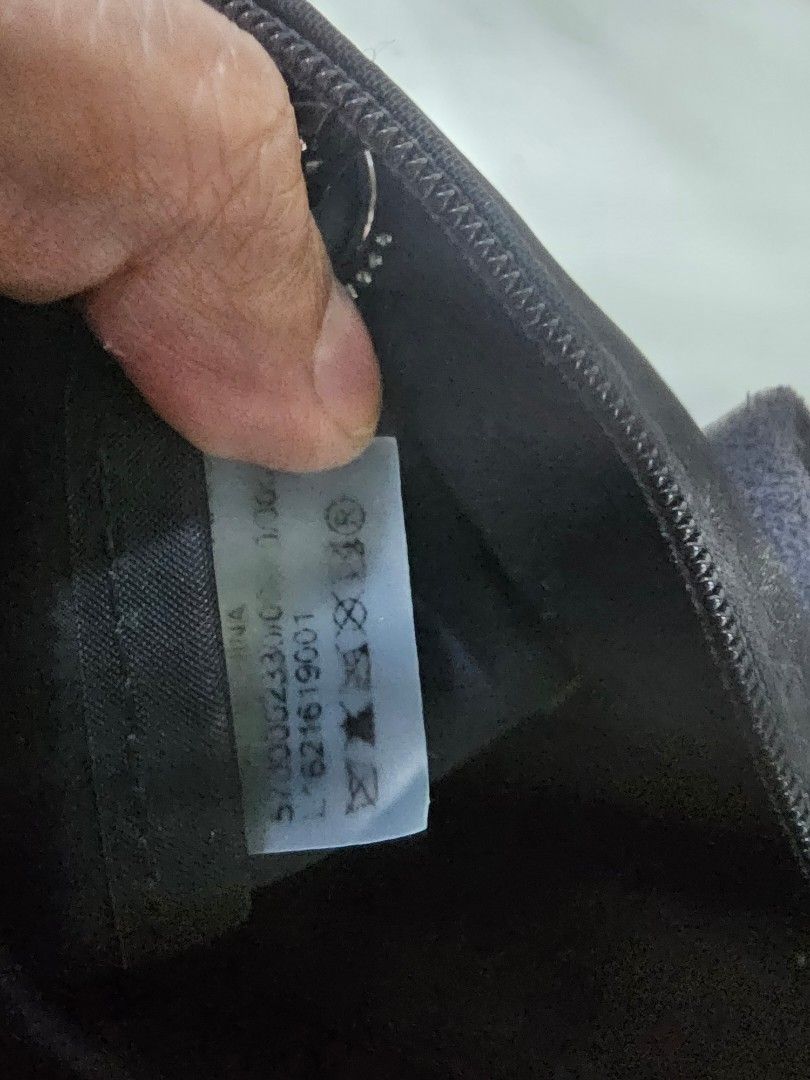 Longchamp Black Handbag with Shoulder Strap MINI (Category: Luxury Bags & Wallets) located in Davao. Submitted by sachigo (Listing ID 1432646297, Image 2). Description: - Authentic Longchamp handbag - Classic black color - Gold-colored logo - Flap closure - Detachable shoulder strap - Secure zipper closure - Interior tag with care instructions - Metal zipper pull with Longchamp logo - Made in China shoulder strap customized by the owner .