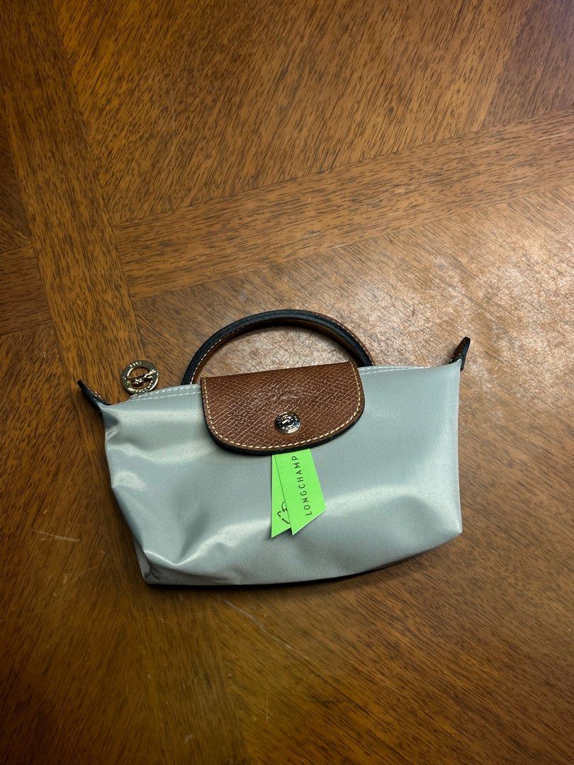 Longchamp Le Pliage Classic Mini Steel (Category: Luxury Bags & Wallets) located in Quezon City. Submitted by luxurybyluci (Listing ID 1432784524, Image 1). Description: Longchamp Le Pliage Classic Mini Steel Available Medium & Large size! - Bnew - Authentic - with inclusion Medium - 6,500 Large - 7,000 Mini - 6500 w/ sling.
