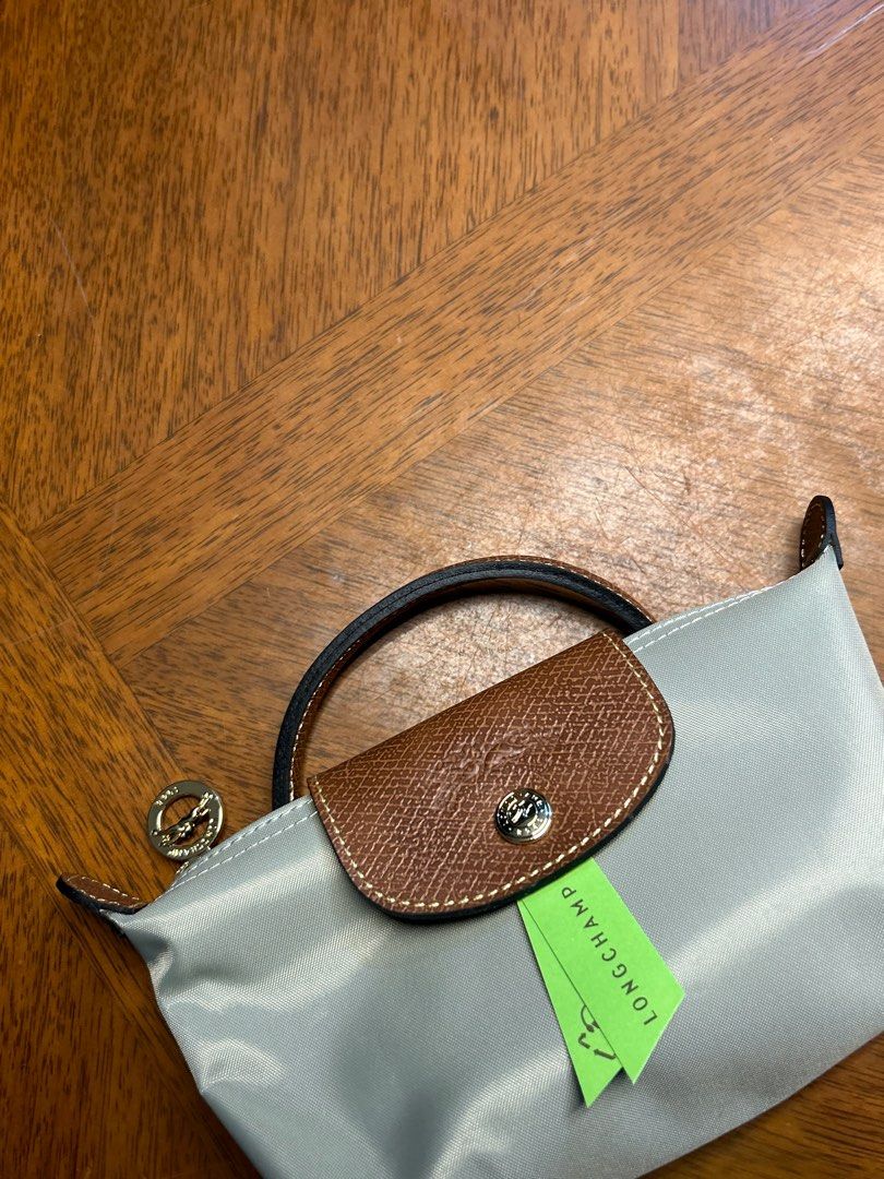Longchamp Le Pliage Classic Mini Steel (Category: Luxury Bags & Wallets) located in Quezon City. Submitted by luxurybyluci (Listing ID 1432784524, Image 2). Description: Longchamp Le Pliage Classic Mini Steel Available Medium & Large size! - Bnew - Authentic - with inclusion Medium - 6,500 Large - 7,000 Mini - 6500 w/ sling.
