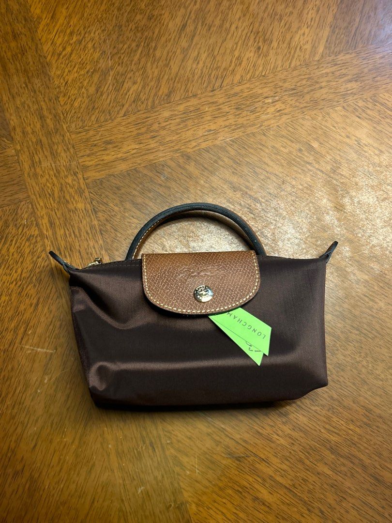 Longchamp Le Pliage Classic Mini Ebony (Category: Luxury Bags & Wallets) located in Quezon City. Submitted by luxurybyluci (Listing ID 1432784718, Image 1). Description: Longchamp Le Pliage Classic Mini Ebony Available Medium & Large size! - Bnew - Authentic - with inclusion Medium - 6,500 Large - 7,000 Mini - 6500 w/ sling.