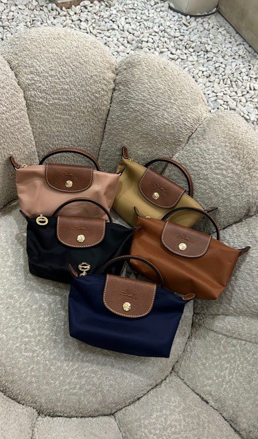 Longchamp Le Pliage Classic Mini (Category: Luxury Bags & Wallets) located in Quezon City. Submitted by luxurybyluci (Listing ID 1432784948, Image 1). Description: Longchamp Le Pliage Classic Mini - 6,500 with sling — Authentic — onhand — Available in different colorway — with inclusions .