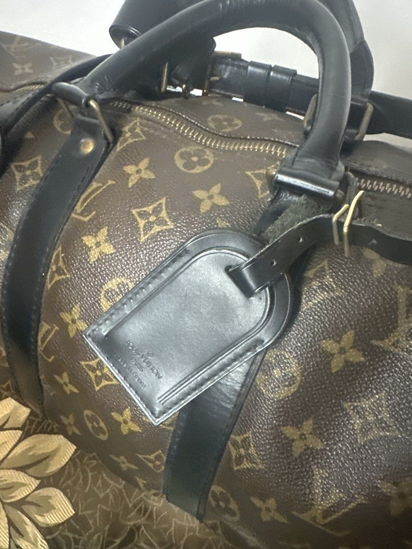 Louis Vuitton Keepall Bandouliere 45 (Category: Luxury Bags & Wallets) located in Batangas. Submitted by jim2621 (Listing ID 1432637036, Image 3). Description: - Authentic Louis Vuitton Keepall Bandouliere 45 - Iconic Monogram canvas. - Black leather trim and handles. - Detachable shoulder strap included. - Comes with a luggage tag. - Spacious interior for travel. - Secure zipper closure. - Classic and timeless design. Including luggage tag not i