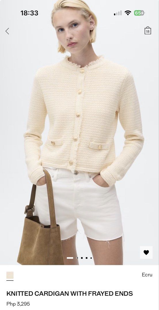 Mango Knitted Cardigan with Frayed Ends (Category: Coats, Jackets and Outerwear) located in Paranaque City. Submitted by mrschuadeclutter (Listing ID 1432704630, Image 1). Description: - Ecru-colored knitted cardigan - Round neck and long sleeves - Textured knit design - Gold-colored buttons - Two front pockets - Frayed ends - Original price: PHP 3,295.