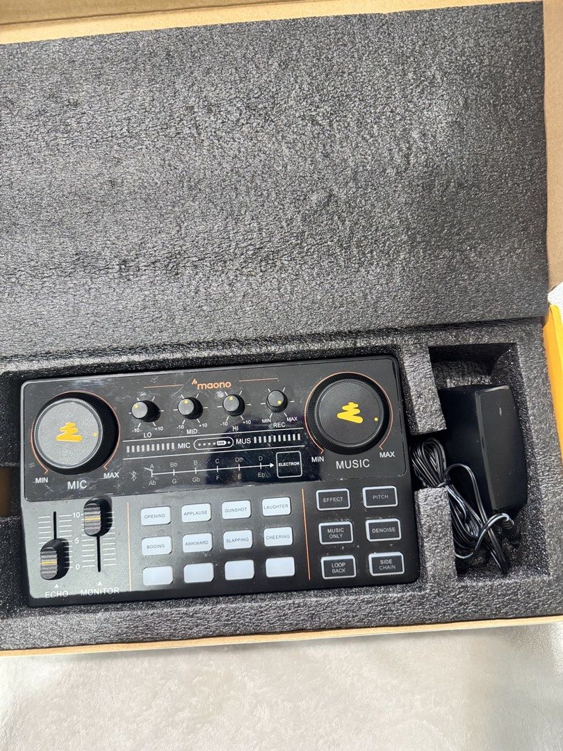 MaonoCaster Lite AU-AM200 Podcast Console (Category: TV Consoles) located in Quezon City. Submitted by chrollo7 (Listing ID 1432664559, Image 2). Description: - Portable podcast console for professional audio - Supports 2-person live streaming and up to 4 platforms - Dual microphone input - Independent volume control for mics and accompaniment - Bluetooth 5.0 wireless connection - Up to 8 hours of battery life - Bought for 4k.