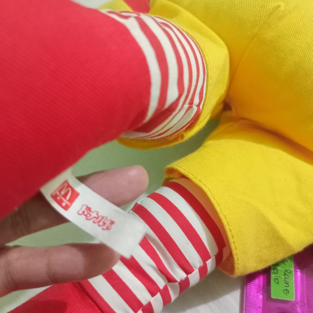 McDonald's Ronald McDonald Plush Doll (Category: Plushies & Soft Toys) located in Manila. Submitted by feg39 (Listing ID 1432686954, Image 3). Description: - Vintage Ronald McDonald plush doll - Large doll features: - Red wig - Yellow jumpsuit with McDonald's logo - Red and white striped sleeves and legs - Smiling face - Red shoes - Includes a smaller Ronald McDonald doll holding a soccer ball - Tag with Japanese text *** 16inch Grimace 2002 is a
