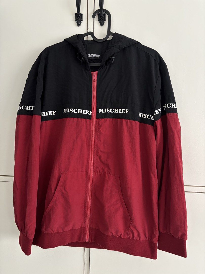 Mischief Colorblock Hooded Jacket (Category: Coats, Jackets and Outerwear) located in Muntinlupa City. Submitted by aoki29 (Listing ID 1432631758, Image 1). Description: - Colorblock design (black and red) - Full zip closure - Hooded - "MISCHIEF" print on chest - Two front pockets.