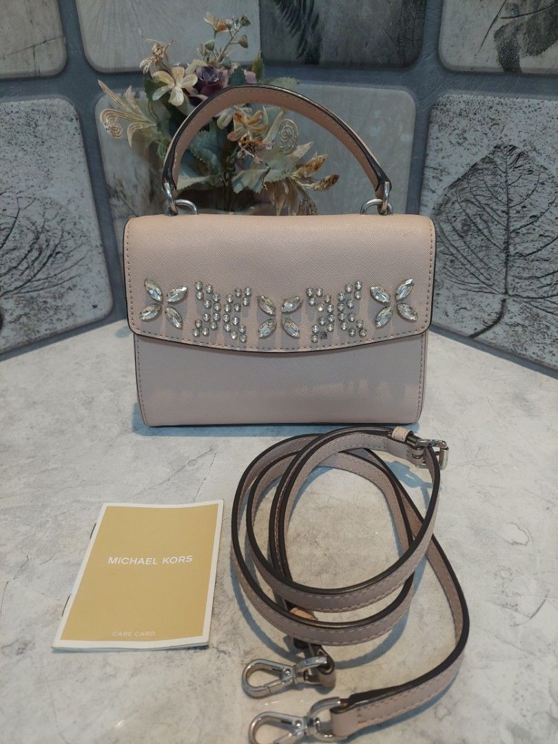 MK Ava (Category: Cross-body Bags) located in Rizal. Submitted by stobelly (Listing ID 1432724708, Image 1). Description: Original MK Preloved In very good used condition Small size Actual picture posted.