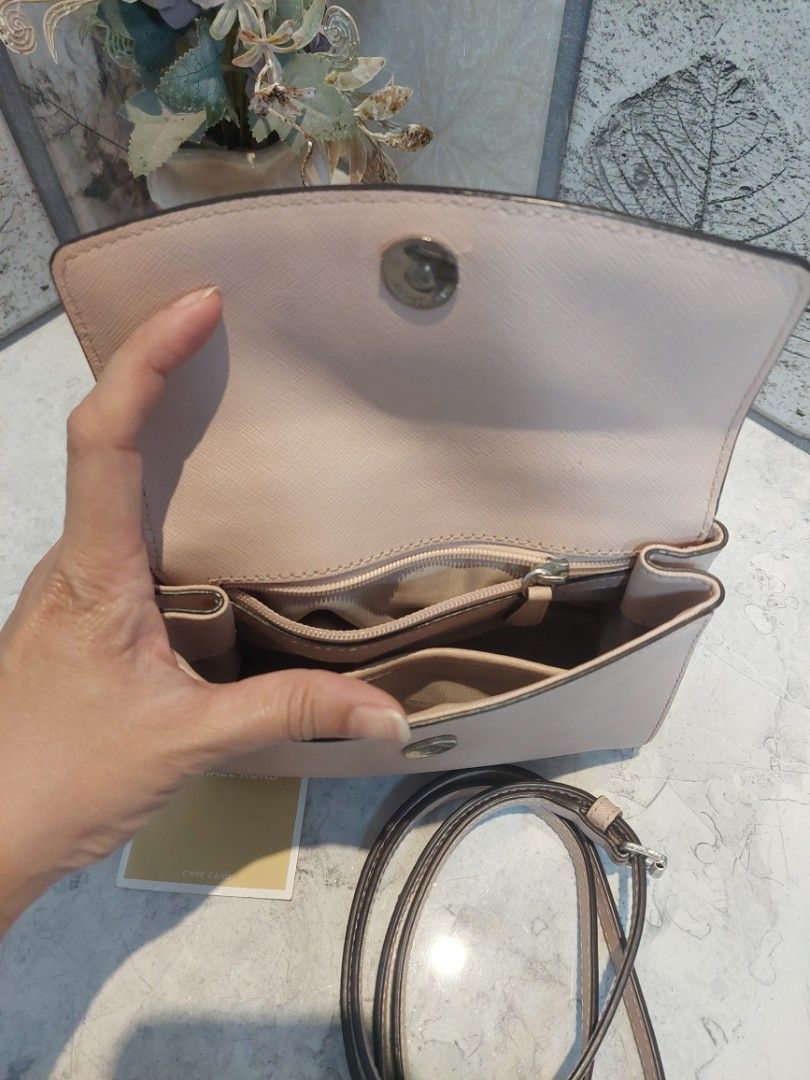 MK Ava (Category: Cross-body Bags) located in Rizal. Submitted by stobelly (Listing ID 1432724708, Image 2). Description: Original MK Preloved In very good used condition Small size Actual picture posted.