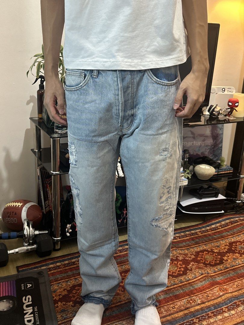 MNML Straight-Wide Ripped Jeans (Category: Jeans) located in Quezon City. Submitted by mudsoapgrails (Listing ID 1432624124, Image 3). Description: Size 31 on tag Waist: 32” Rise: 12.5” Hips: 40” Outseam: 39.5” Inseam: 27.5” Height of model: 5’9 Condition: 10/10 (rarely worn).