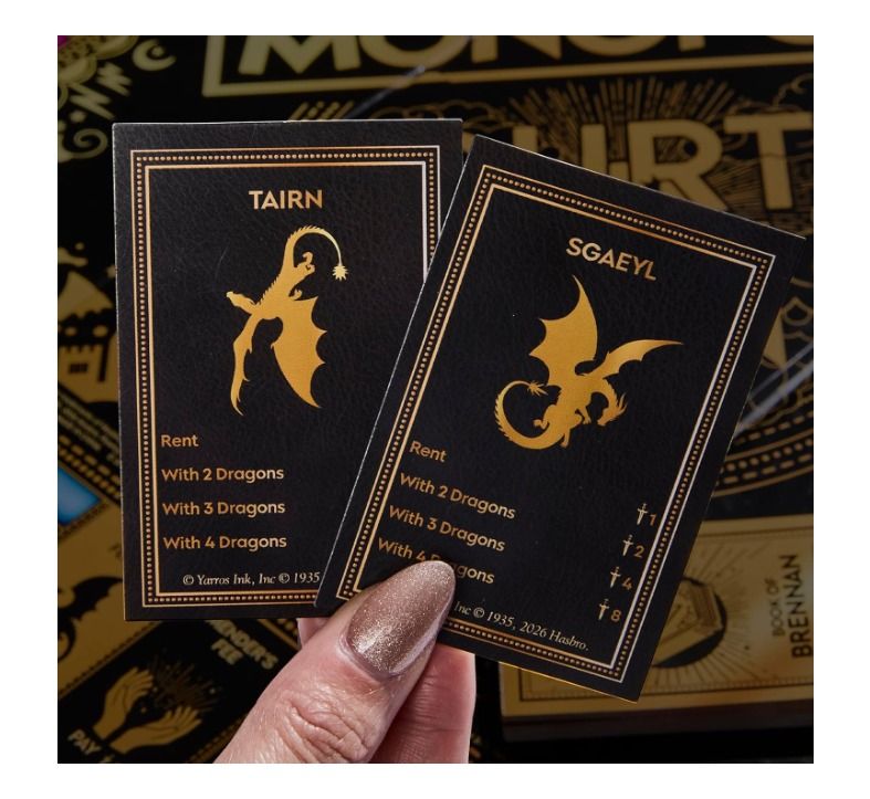 Monopoly Fourth Wing Edition Board Game (Category: Board Games & Puzzles) located in Manila. Submitted by oddbooks (Listing ID 1432692528, Image 3). Description: Monopoly: Fourth Wing Edition - Based on the Fourth Wing series. - Features a black and gold design. - Includes dragon-themed tokens and cards. - Includes game board, tokens, cards, and dice. - Features property cards and dragon rider cards. ✅ Brand new 🔴 ETA 7-10 days 🔴 Stocks may be 