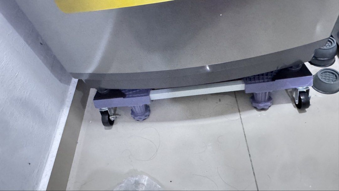 Multifunction Adjustable Base for mesin basuh (Category: Home Improvement Tools & Accessories) located in Kuala Lumpur. Submitted by mashrafismail91 (Listing ID 1432643721, Image 1). Description: - Adjustable base for various appliance sizes. - Sturdy construction with wheels for easy movement. - Suitable for washing machines and other appliances. - Practical solution for moving heavy items..