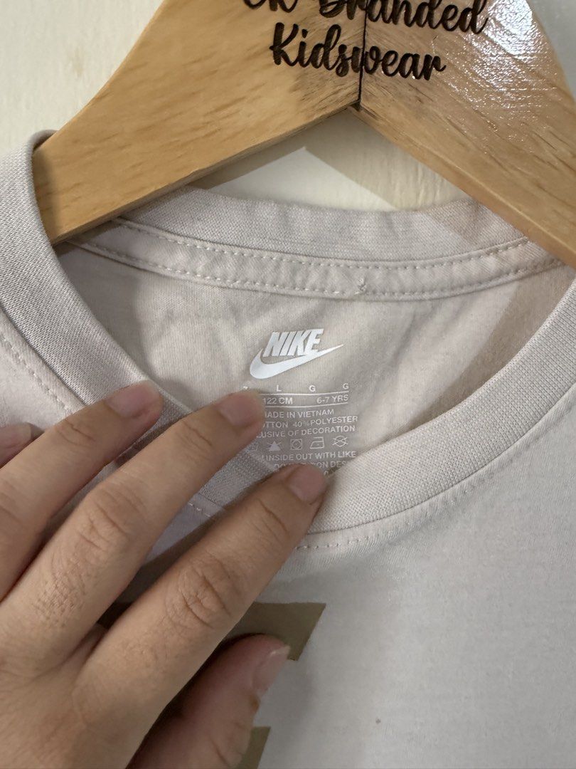 Nike shirt (Category: Babies & Kids Fashion) located in Angeles City. Submitted by buyforless04 (Listing ID 1432725374, Image 2). Description: 6-7.