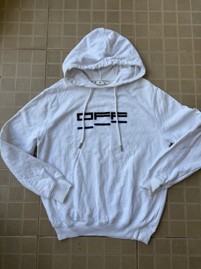 Off-White White Hoodie (Category: Hoodies) located in Legazpi City. Submitted by tiny0509 (Listing ID 1432661159, Image 1). Description: - Off-White hoodie - Graphic design on front - Features Off-White logo - Includes "FOR THE NATURE" tag - Made in Milan, Italy, 2013 - Drawstring hood - Ribbed cuffs and hem -23x29 dimes excellent to new no issues.