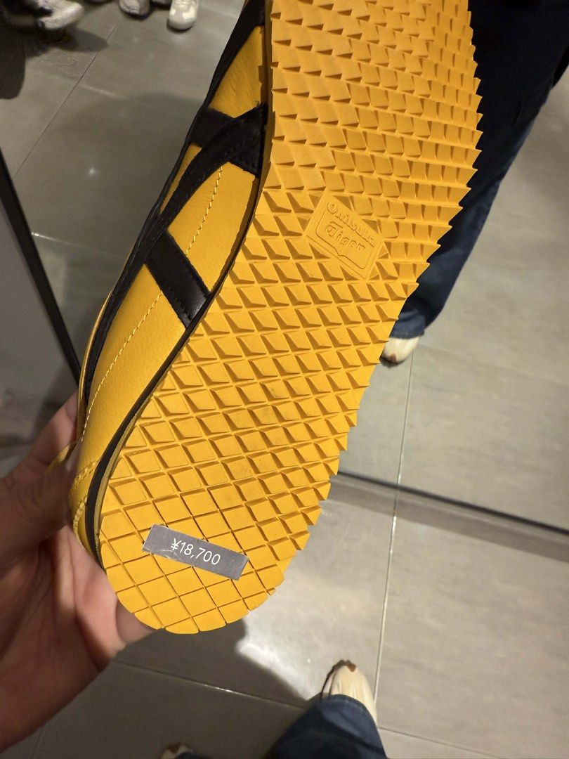 Onitsuka Tiger Mexico 66 Sneakers (Category: Sneakers) located in Cavite. Submitted by keeeeeel (Listing ID 1432688801, Image 2). Description: - Authentic Onitsuka Tiger Mexico 66 sneakers - Eye-catching yellow and black color combination - Features the signature tiger stripes - Classic low-top style - Comfortable textured sole - Comes with the original tag - Price: 7000 - Size: Womens 9 - No box naiwan na sa Japan.