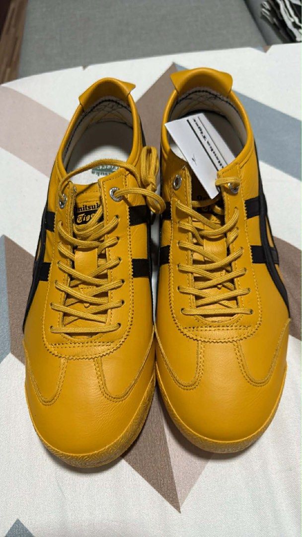 Onitsuka Tiger Mexico 66 Sneakers (Category: Sneakers) located in Cavite. Submitted by keeeeeel (Listing ID 1432688801, Image 1). Description: - Authentic Onitsuka Tiger Mexico 66 sneakers - Eye-catching yellow and black color combination - Features the signature tiger stripes - Classic low-top style - Comfortable textured sole - Comes with the original tag - Price: 7000 - Size: Womens 9 - No box naiwan na sa Japan.