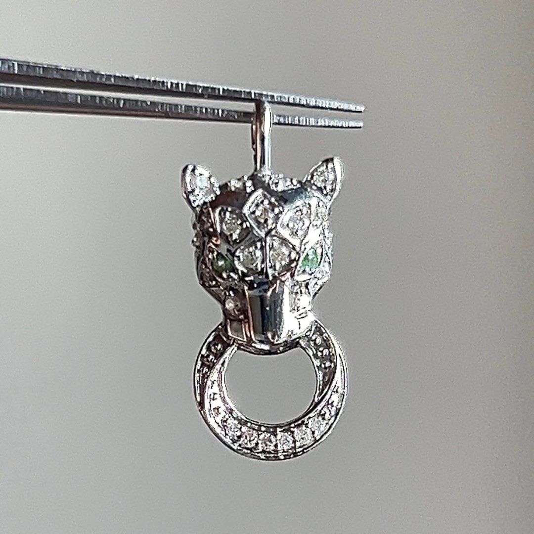 Panther Pendant with Crystals (Category: Necklaces) located in Manila. Submitted by lev777 (Listing ID 1432783518, Image 3). Description: Panther Pendant .10ct dia 18k white gold HK setting 0.02ct green garnet with certificate MOP VIA BANK TRANSFER OR CASH ONLY Through your own courier STRICTLY PAYMENT FIRST ‼️ Can do meetup BGC, Vistamall, Taguig .