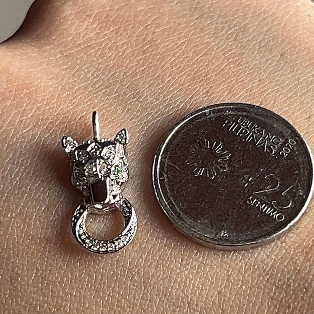 Panther Pendant with Crystals (Category: Necklaces) located in Manila. Submitted by lev777 (Listing ID 1432783518, Image 2). Description: Panther Pendant .10ct dia 18k white gold HK setting 0.02ct green garnet with certificate MOP VIA BANK TRANSFER OR CASH ONLY Through your own courier STRICTLY PAYMENT FIRST ‼️ Can do meetup BGC, Vistamall, Taguig .