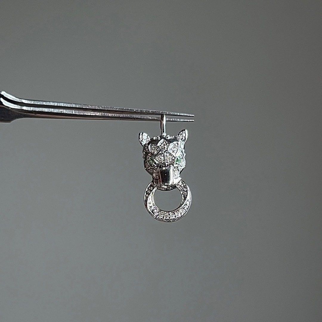 Panther Pendant with Crystals (Category: Necklaces) located in Manila. Submitted by lev777 (Listing ID 1432783518, Image 1). Description: Panther Pendant .10ct dia 18k white gold HK setting 0.02ct green garnet with certificate MOP VIA BANK TRANSFER OR CASH ONLY Through your own courier STRICTLY PAYMENT FIRST ‼️ Can do meetup BGC, Vistamall, Taguig .