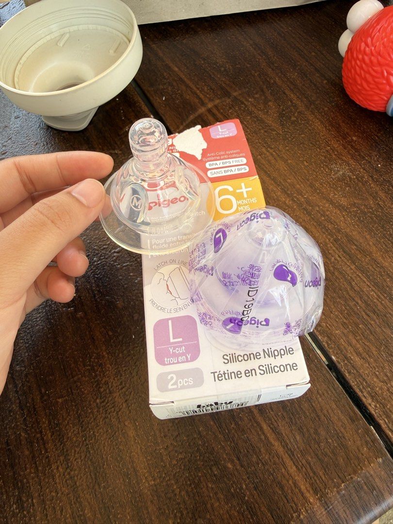 Pigeon Silicone Nipple Y-Cut 2pcs (Category: Breastfeeding & Bottle Feeding) located in Bacolor. Submitted by dmdznt (Listing ID 1432614997, Image 1). Description: - Pigeon L-cut silicone nipples, perfect for babies 6+ months. - Package includes 1pc - BPA/BPS free. - Original price: ₱649 -with extra nipple, forgot the brand but bought in SM.