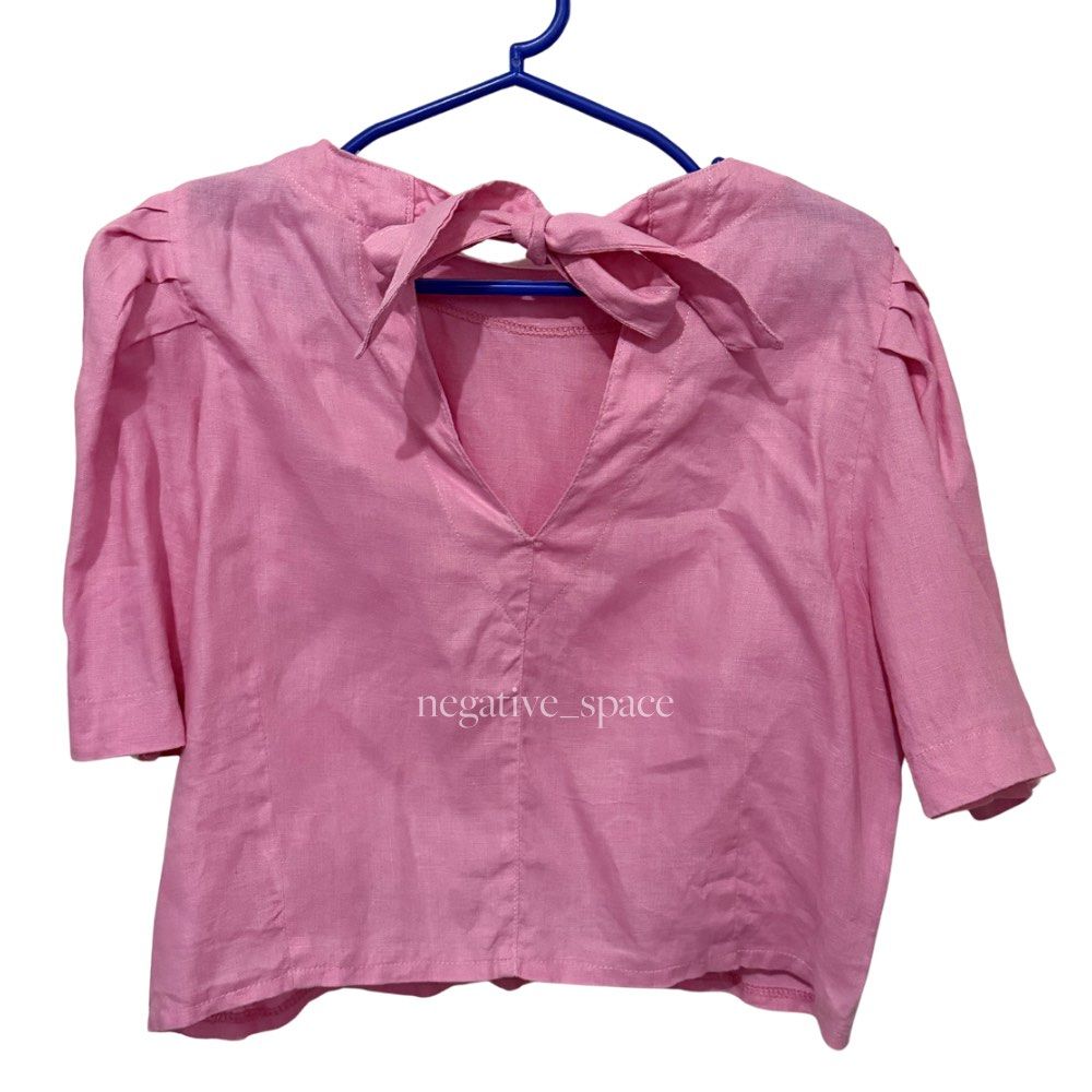 Pink Linen Bow Puff Sleeve Top (Category: Sleeveless) located in Quezon City. Submitted by negative_space (Listing ID 1432699461, Image 2). Description: Bought this from Frankies in Podium. Screenshots are when worn and price reference only, the item is pink! RFS: Decluttering. Payment Methods: BPI/Gcash/Maya Shipping via Grab Express or Lalamove within Metro Manila or LBC for provincial address. Fee to be shouldered by buyer..