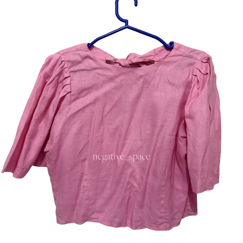 Pink Linen Bow Puff Sleeve Top (Category: Sleeveless) located in Quezon City. Submitted by negative_space (Listing ID 1432699461, Image 1). Description: Bought this from Frankies in Podium. Screenshots are when worn and price reference only, the item is pink! RFS: Decluttering. Payment Methods: BPI/Gcash/Maya Shipping via Grab Express or Lalamove within Metro Manila or LBC for provincial address. Fee to be shouldered by buyer..