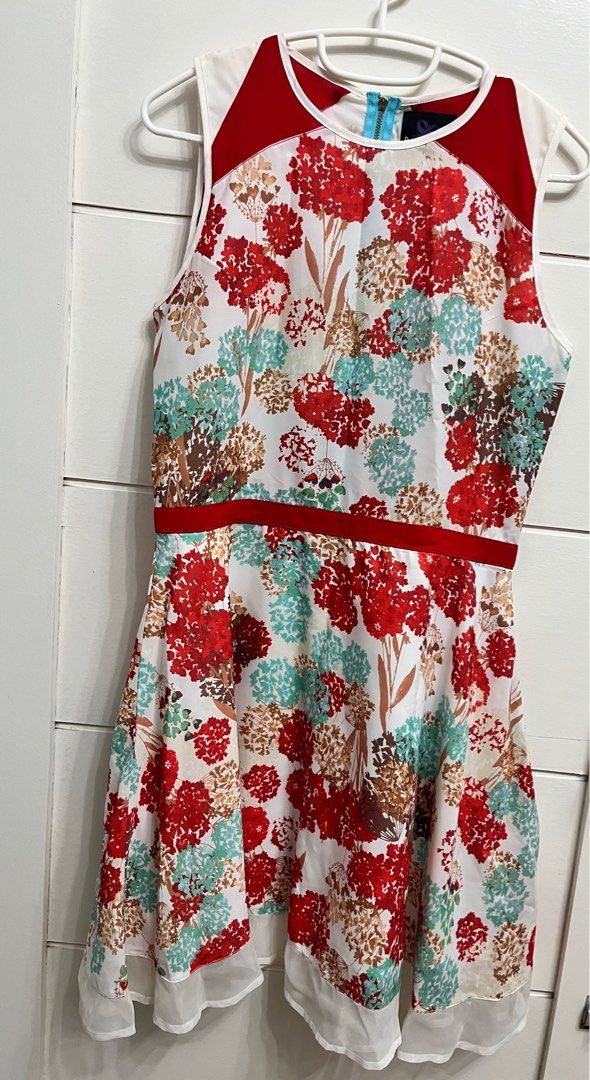 Plains & Prints Floral Dress (Category: Dresses) located in Bulacan. Submitted by spring_cleaning_ (Listing ID 1432719145, Image 1). Description: - Plains & Prints floral dress - Vibrant red, white, and teal floral pattern - Sleeveless A-line silhouette - Features a red waistband - Zipper closure at the back - Size: PHL M / EUR 10 / USA 6.