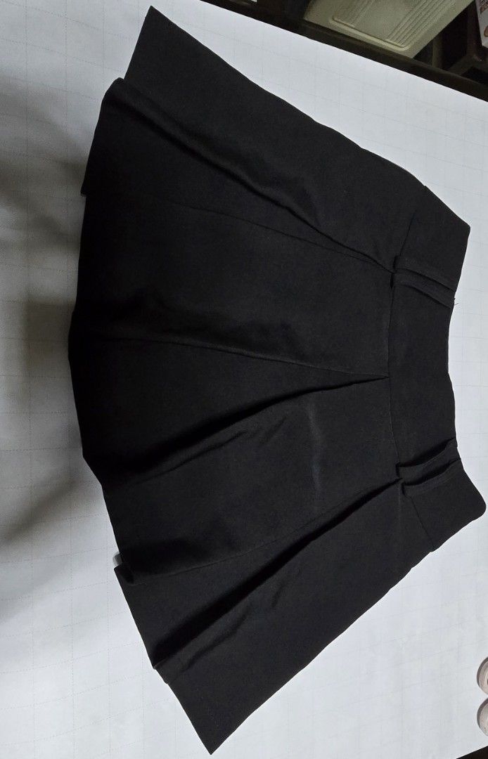 Pleated Mini Skirt with under shorts (Category: Skirts) located in Manila. Submitted by sydling (Listing ID 1432706785, Image 3). Description: -Belt not included -Mid-waisted design - Size S - Flared silhouette - Built-in shorts lining -Thick material -side zipper closure -Used twice rfs: not my style and a bit tight on me.