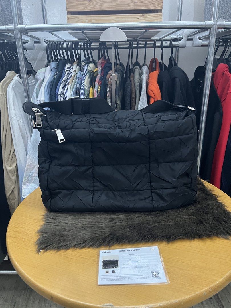 Prada Quilted Bag (Black) with entrupy (Category: Luxury Bags & Wallets) located in Quezon City. Submitted by eclipse.leandro (Listing ID 1432722760, Image 2). Description: Prada Quilted Bag (Black) with entrupy Condition: 9/10 39cm x 23 cm 38,500 PHP All products are 100% Authentic bought from Japan. Disclaimer: We are not affiliated with the brands listed. #LuvLuxe #LuxuryJPNFinds.