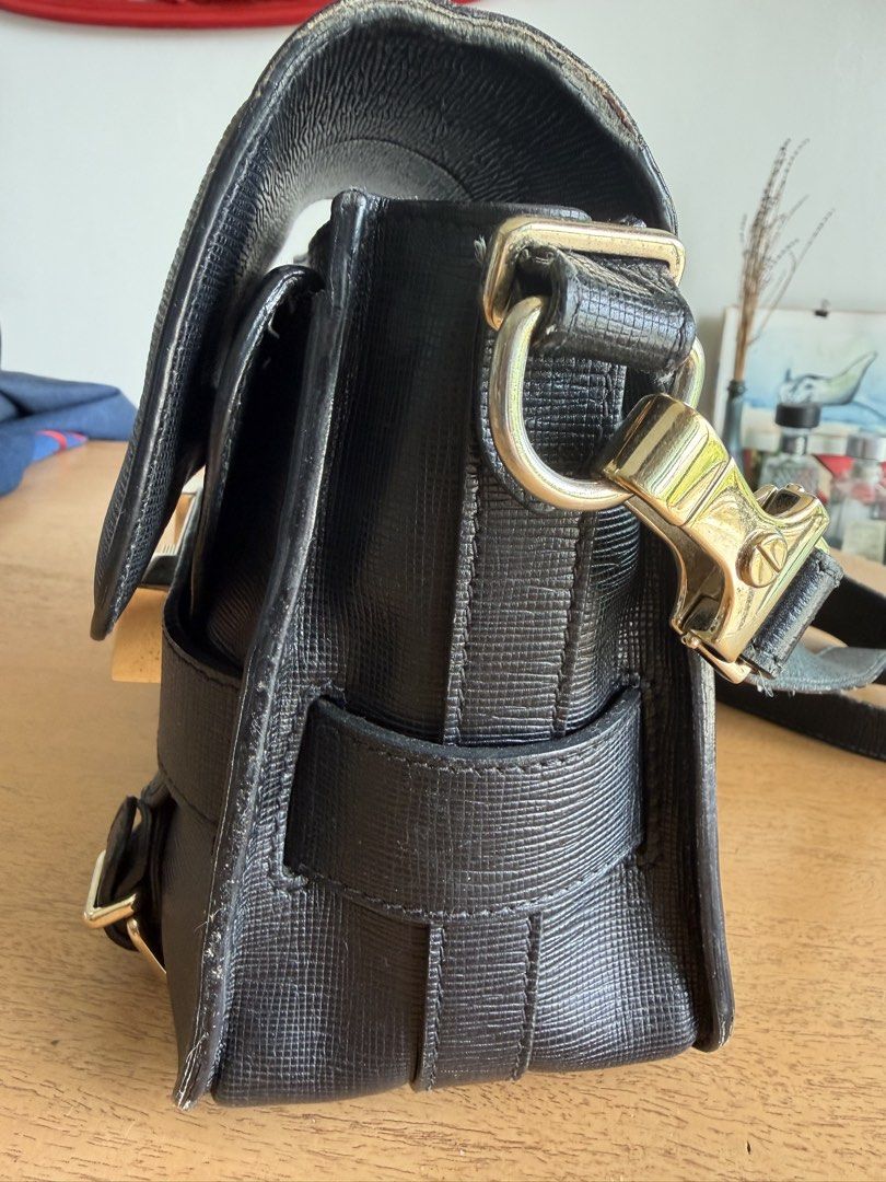 Proenza Schouler PS1 Medium Black Leather Bag (Category: Luxury Bags & Wallets) located in Cebu City. Submitted by miguelgsarmiento (Listing ID 1432623753, Image 3). Description: - Proenza Schouler PS1 Medium bag - Black textured leather - Flap closure with metal clasp - Shoulder strap - Exterior: Zippered back pocket, front pocket under flap - Interior: Zippered pocket - Includes original tags and care card Condition : Some indentations and scuf