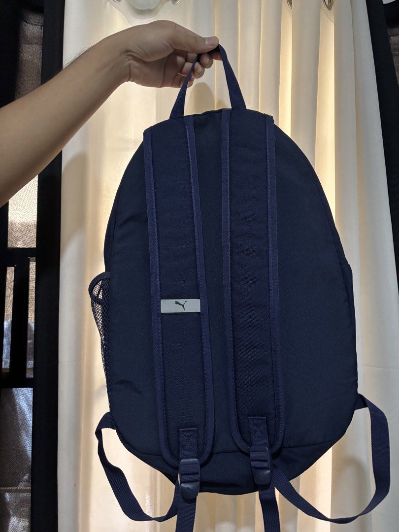 Puma Backpack (Category: Backpacks) located in Manila. Submitted by yannpreloved_ (Listing ID 1432647833, Image 2). Description: Navy blue Puma backpack Loc: Quezon City Rfs: decluttering Issue: stains in Puma print.