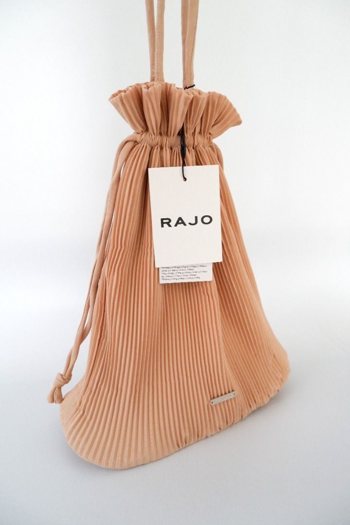 Rajo Laurel | Pleated Drawstring Pouch Bag | Beige (Category: Purses & Pouches) located in San Juan City. Submitted by olispace (Listing ID 1432707003, Image 3). Description: Rajo Laurel | Pleated Drawstring Pouch Bag | Beige 🌷Condition: 10/10 Original Price: ₱1,995 📌Sale Price: ₱1,299 —RFS: Decluttering 🧺 📍Brgy. Balong-bato, San Juan City MOP: Gcash MOD: Lalamove.