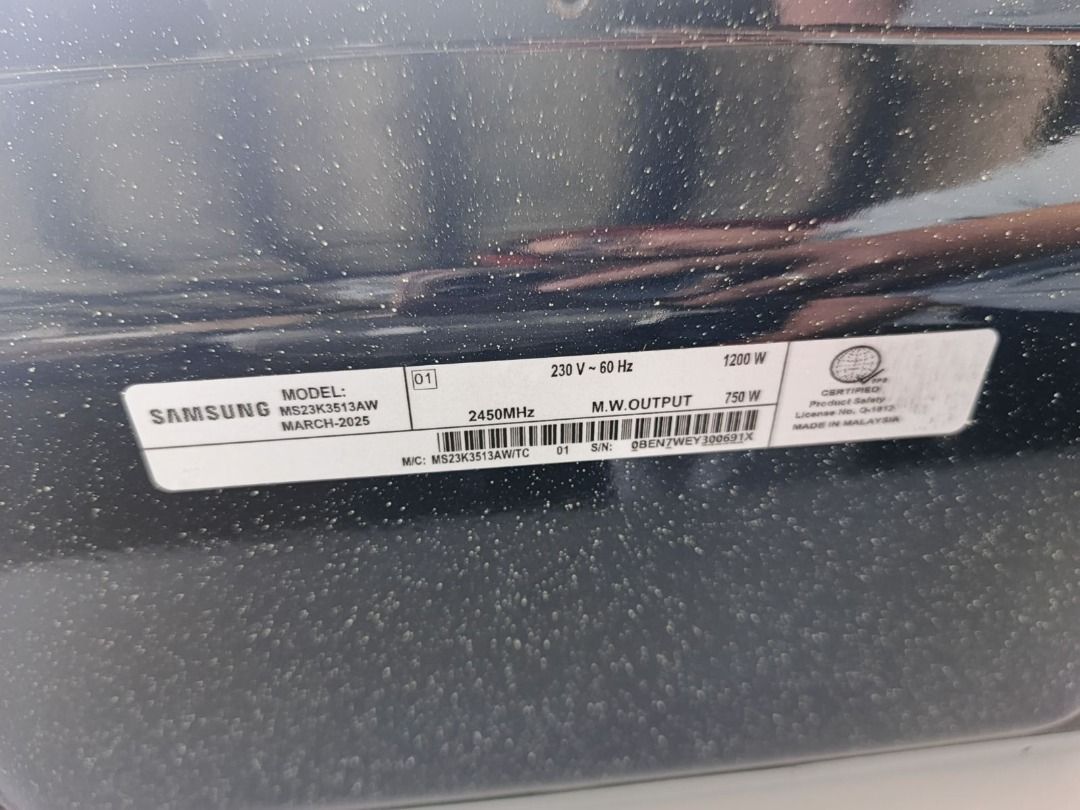 Samsung Microwave Oven MS23K3513AW (Category: Ovens & Toasters) located in San Pedro. Submitted by cgi.saversplustrading (Listing ID 1432615631, Image 3). Description: - Samsung microwave oven (Model: MS23K3513AW) - Ceramic interior - Microwave Output: 750W - Power Consumption: 1200W - Voltage: 230V, 60 Hz - Color: Black front panel, White top - Manufactured: March 2023.