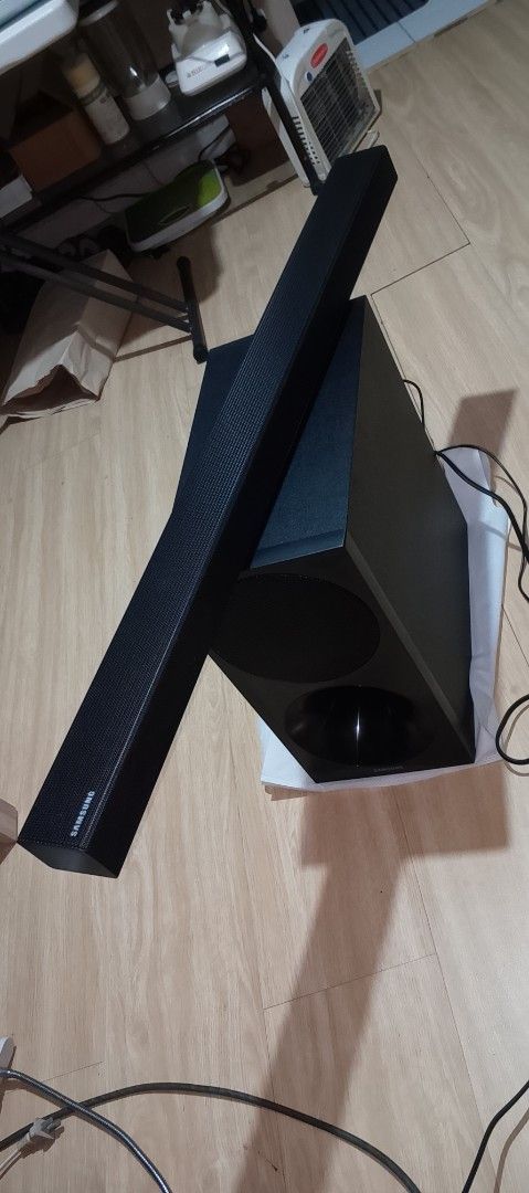 Samsung Soundbar with Subwoofer (Category: Soundbars, Speakers & Amplifiers) located in Quezon City. Submitted by expe888 (Listing ID 1432700176, Image 1). Description: - Black Samsung soundbar and big subwoofer - Sleek, rectangular design - Includes power cables -2 pcs remote controller - Enhances home entertainment.