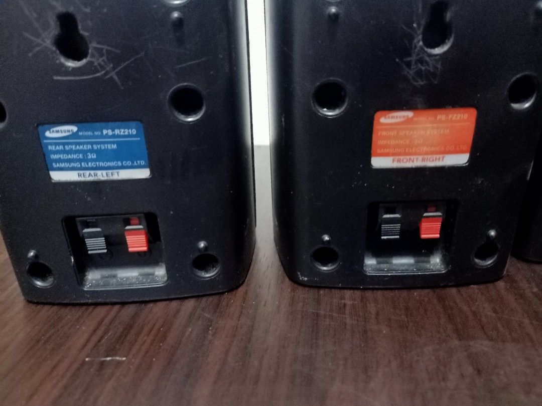 Samsung Surround Sound Speakers 4pcs (Category: Soundbars, Speakers & Amplifiers) located in Las Pinas. Submitted by the_recycle_shop (Listing ID 1432745474, Image 3). Description: - Samsung surround sound speaker set (4 speakers total) - Includes: 2 front speakers, 2 rear speakers - Models: PS-FZ210 and PS-RZ210 - Sleek black finish - Designed for wall mounting - Features speaker terminals for easy connection - Samsung logo present.