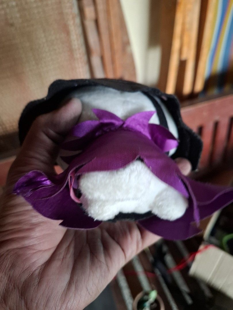 Samurai Cat Plushie Orig Japan (Category: Plushies & Soft Toys) located in Valenzuela. Submitted by winssian (Listing ID 1432721327, Image 2). Description: - Unique black and white plushie design. - Features a black cap with button details. - Adorned with a charming purple bow. - Soft and cuddly texture. - Perfect for collectors or as a gift. - Handmade item..